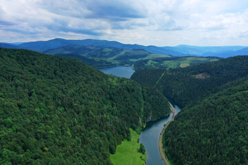 Naklejka na ściany i meble Aerial view of the Palcmanska masa water reservoir in the village of Dedinky