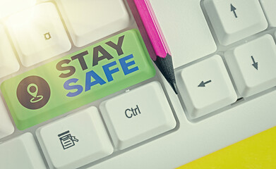 Handwriting text writing Stay Safe. Conceptual photo secure from threat of danger, harm or place to...