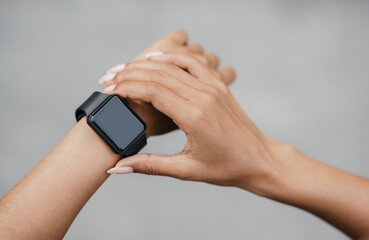 Check activity of body. African american girl check smart watch with blank screen