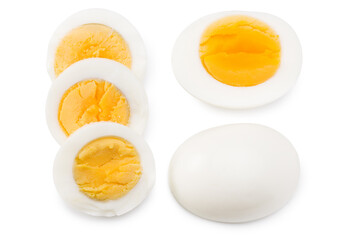 Single whole boiled egg with halved egg isolated on a white background. Top view