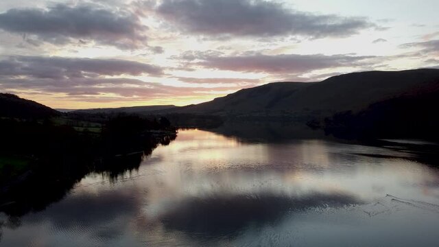 Morning sky over Ullswater lake, aerial view
