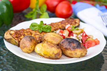 baked zucchini and baked potatoes