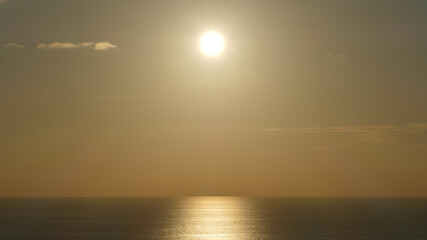 Sunset and reflections in the Cantabrian Sea, Basque Country.