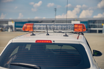 Airport ground vehicle parked at the airfield