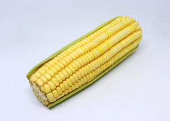 Fresh green corn isolated on white background