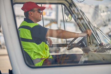 Man in a car looking in front of him