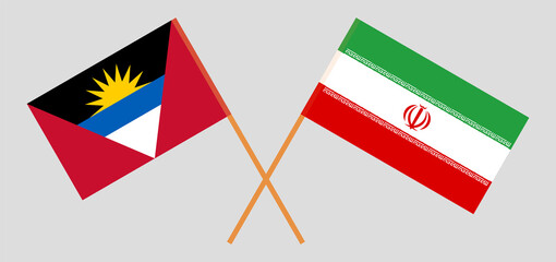 Crossed flags of Iran and Antigua and Barbuda