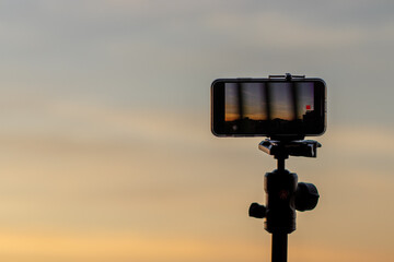 sunset timelapse with smartphone on a tripod at sunset