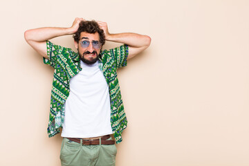 young cool bearded man crazy or mad expression. holidays concept