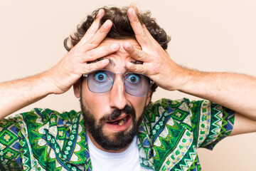 young cool bearded man crazy or mad expression. holidays concept