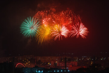 Beautiful fireworks in the night sky. There is no main object in the image