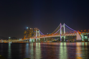 Fototapeta premium Gwangan Bridge lit up at night in Busan, South Korea.