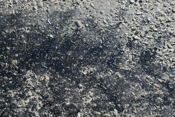 bitumen on the asphalt road, which melts due to the heat in the summer, melted pitch and asphalt road, hot and melted asphalt roads,