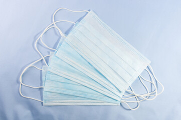 Background concept for news about the novel coronavirus COVID-19 pandemic, antiviral medical mask...