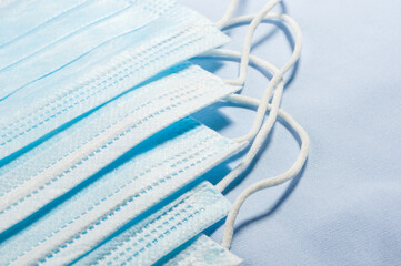 Background concept for news about the novel coronavirus COVID-19 pandemic, antiviral medical mask...