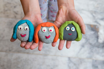 Playing with stones and play dough for children’s activities in preschool or nursery.creative ideas for child development.back to school and happy teachers day concept.