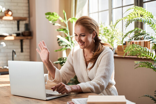 Positive Woman Enjoying Friendly Video Call At Home