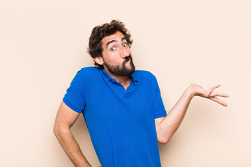young cool bearded man thinking or confused.