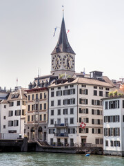 Cityscape of Zurich and river Limmat in daytime with blue sky, Switzerland