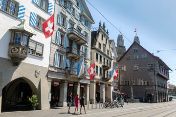 A view of historic city center of Zurich with Swiss flags, Switzerland