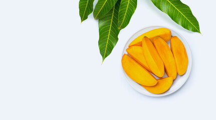 Tropical fruit, Mango slices on plate on white background.