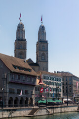 Fototapeta na wymiar Zurich, Switzerland. View of the historic city center with famous Grossmunster Church, on the Limmat river.