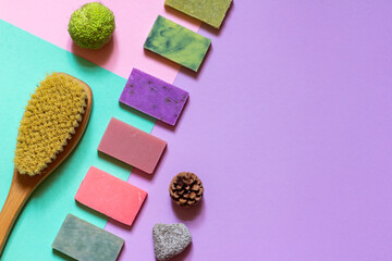 Multi-colored handmade soap made from natural ingredients on a colored background. the layout of the space