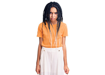 Cute african american girl wearing casual clothes skeptic and nervous, frowning upset because of problem. negative person.