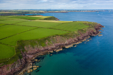 Aerial view of fields and ocean