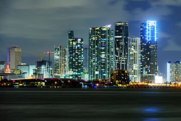 Miami night downtown. Miami business district, lights and reflections of the city.