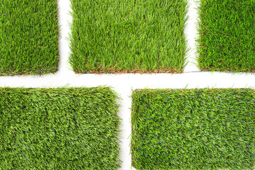 Detail of types of artificial grass in a sample book. - obrazy, fototapety, plakaty