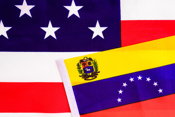 Flag of Venezuela on the American national flag, two countries with conflict between them.