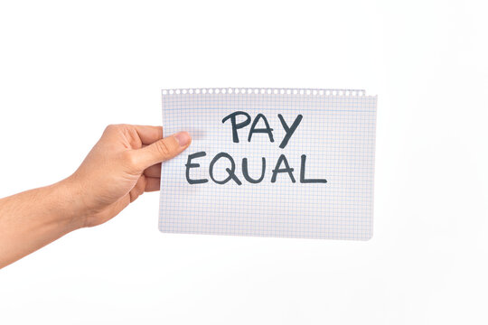 Cardboard banner protesting for equal payment for women and men over isolated white background