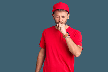 Young handsome blond man wearing t-shirt and cap feeling unwell and coughing as symptom for cold or bronchitis. health care concept.