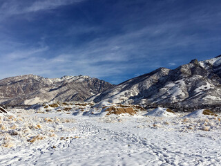 Utah skyline and Wasatch mountains covered in snow during the winter. 