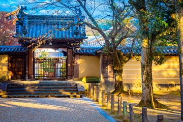 Fototapeta premium Japan. Kyoto. Gate of the Buddhist temple in Kyoto. A Shinto Church. Iconic buildings in Kyoto. Travelling to Japan. Buddhism. Architecture Of Japan. Higashi-Honganji Temple. East Asia travel guide.