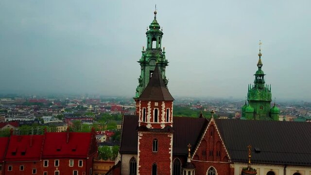 Aerial descending shot of Polish castle in Krakow. 4K at 30 FPS