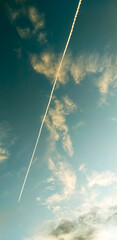 rocket trail in the blue sky