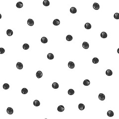 Simple seamless repeat pattern with hand-drawn scribble sketched polka dot on a white background