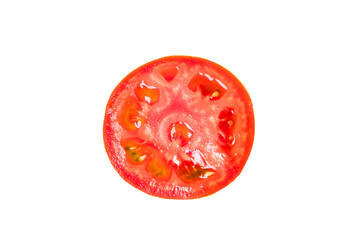 Slice of red tomato isolated on a white background.