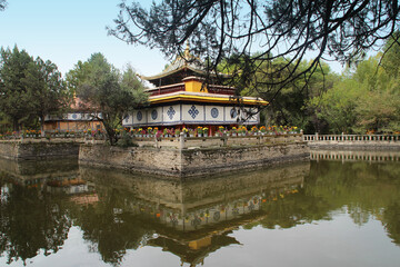 Naklejka premium A pavilion, the Tsokyil Potrang, in the Norbulingka (Summer Palace) at Lhasa, Tibet, China