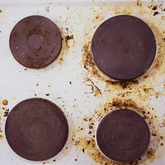 Dirt and grease on the white stove