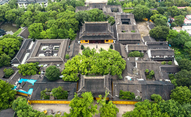 Aerial of Ancient traditional Buddhist temple, Suzhou garden, in China.