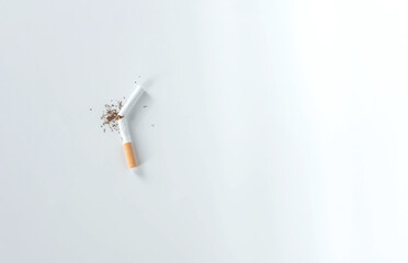 broken cigarette isolated on white background with copy space from top view. World No Tobacco Day Tobacco and lung health concept .