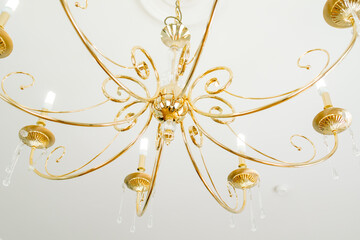 Beautiful gold plated chandelier with curls