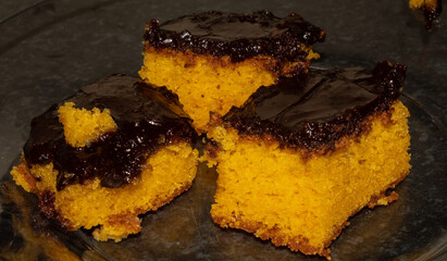 Carrot cake with chocolate syrup.