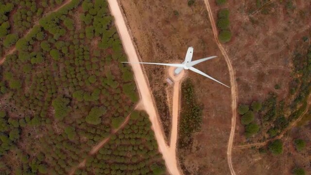 Aerial Shot Flying Over A Wind Turbine In Barao De Sao Joao, Portugal.