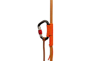 Carbine tied with a rope to a wooden bar close up