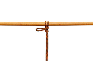 Rope tied around a wooden log