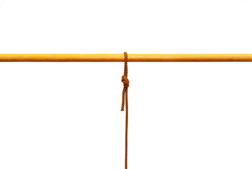 Rope tied around a wooden log